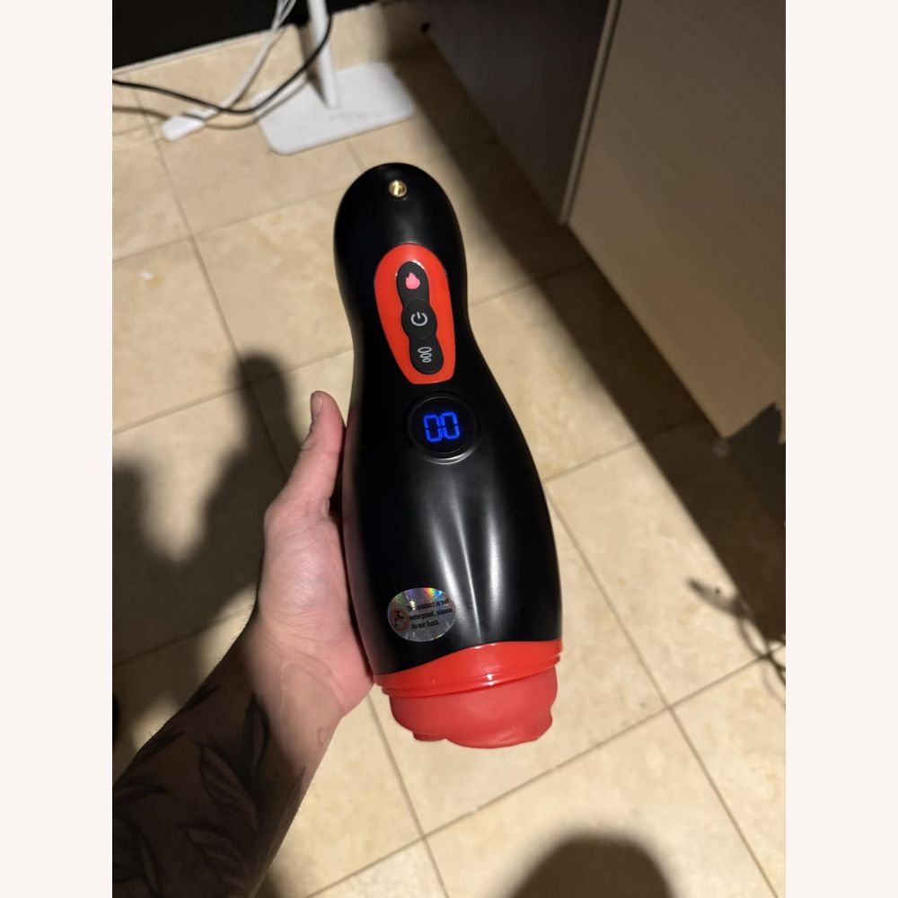 Heating Blowjob Machine with 9 Sucking & 9 Vibrating with Phone Holder APP Control